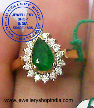 Emerald Ring Designs with Diamonds in Gold for Ladies